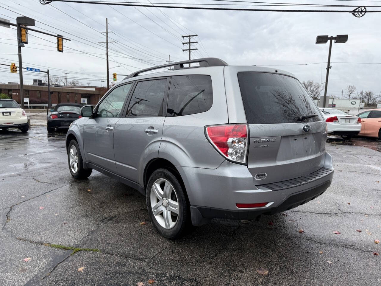 2010 Subaru Forester for sale at AVS AUTO GROUP LLC in CLEVELAND, OH