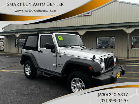 2012 Jeep Wrangler for sale at Smart Buy Auto Center - Oswego in Oswego IL