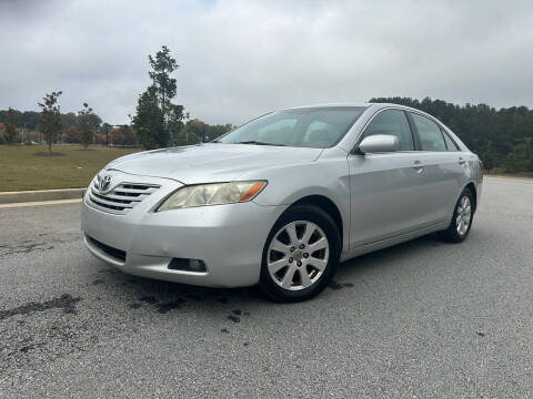 2009 Toyota Camry for sale at FALCONS AUTOMOTIVE LLC in Buford GA