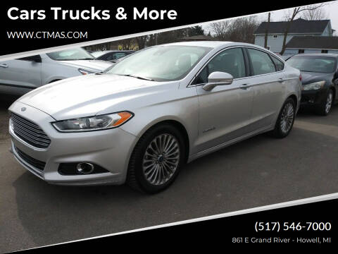 2014 Ford Fusion Hybrid for sale at Cars Trucks & More in Howell MI