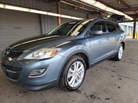 2011 Mazda CX-9 for sale at KM Motors LLC in Houston TX
