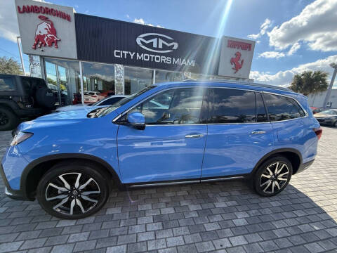 2021 Honda Pilot Touring w/Rear Captain's Chairs