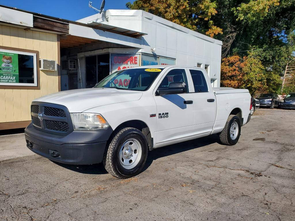 2014 Ram 1500 for sale at DAGO'S AUTO SALES LLC in Dalton, GA