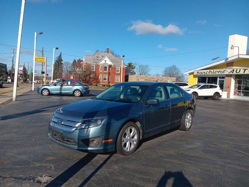 2012 Ford Fusion for sale at Sarchione INC in Alliance OH