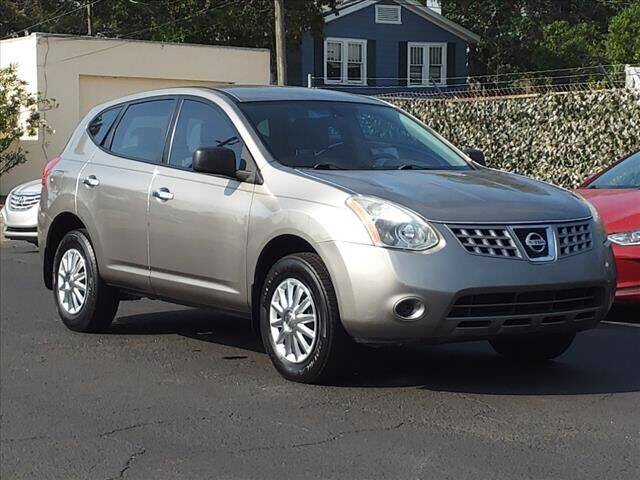 2010 Nissan Rogue for sale at Sunny Florida Cars in Bradenton FL