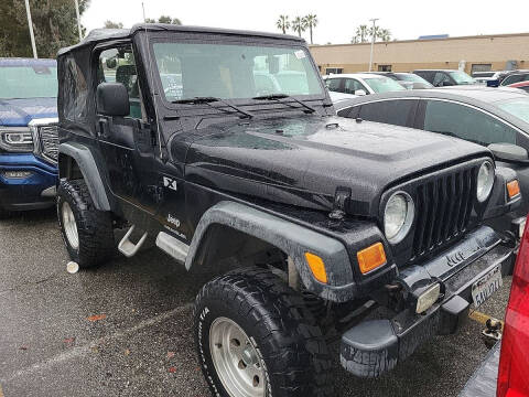 2003 Jeep Wrangler for sale at CARFLUENT, INC. in Sunland CA