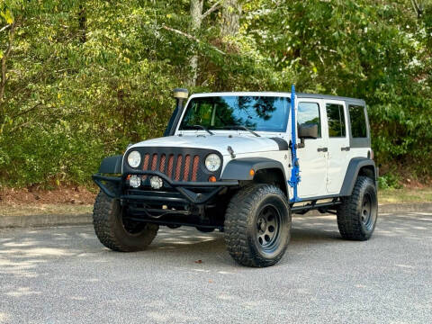 2012 Jeep Wrangler Unlimited for sale at H and S Auto Group in Canton GA