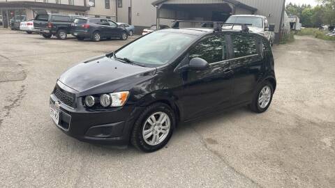 2014 Chevrolet Sonic for sale at COUNTRYSIDE AUTO INC in Austin MN