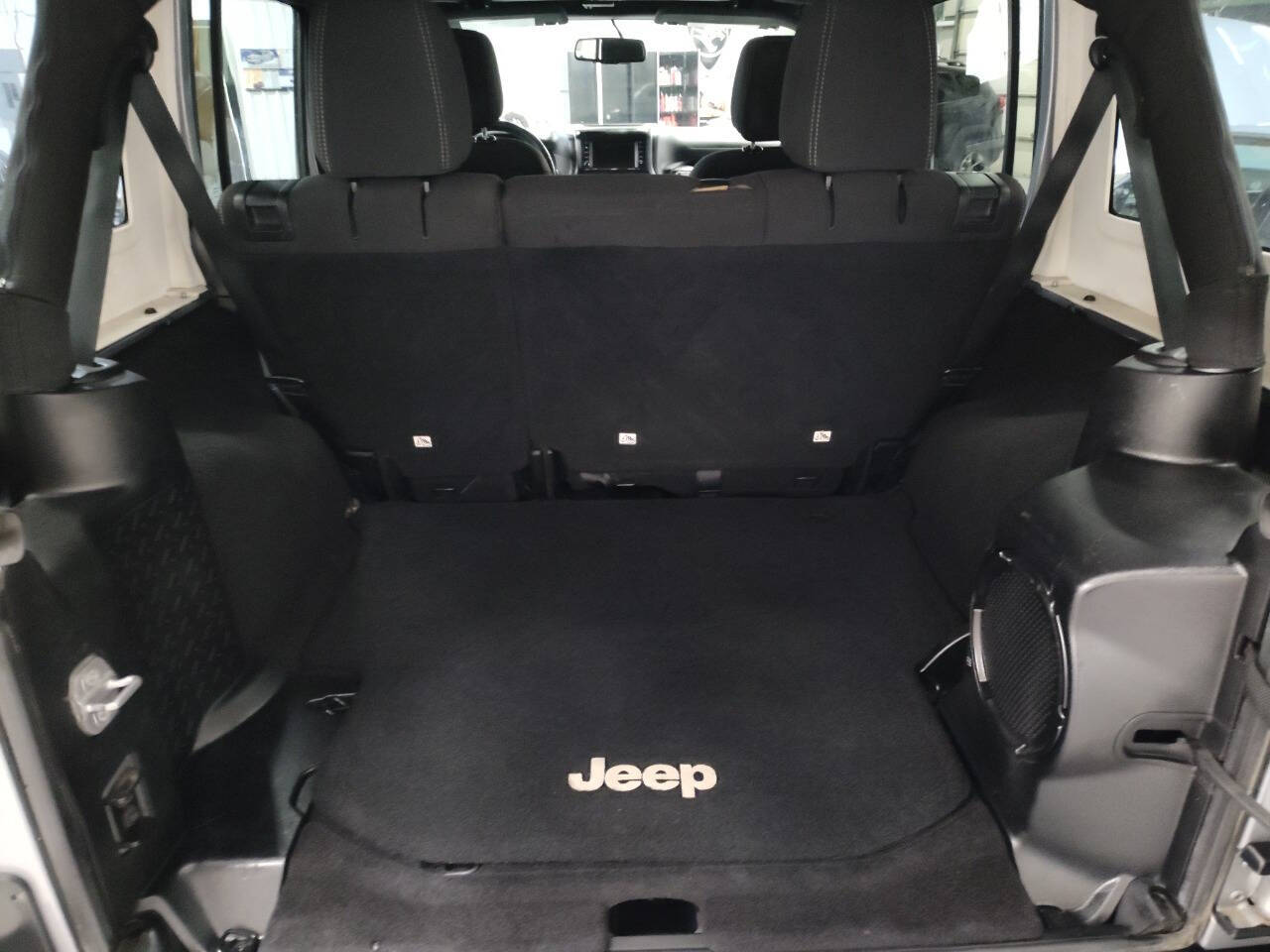 2014 Jeep Wrangler Unlimited for sale at THOMPSON MOTOR GROUP LLC in Hudsonville, MI