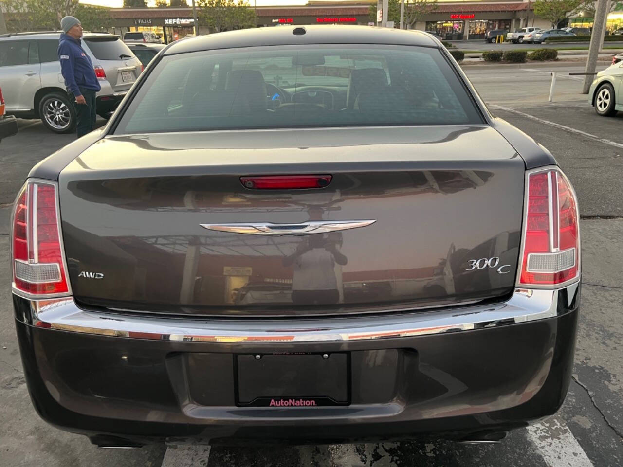 2014 Chrysler 300 for sale at Unique Auto Sales, Inc. in Bell, CA