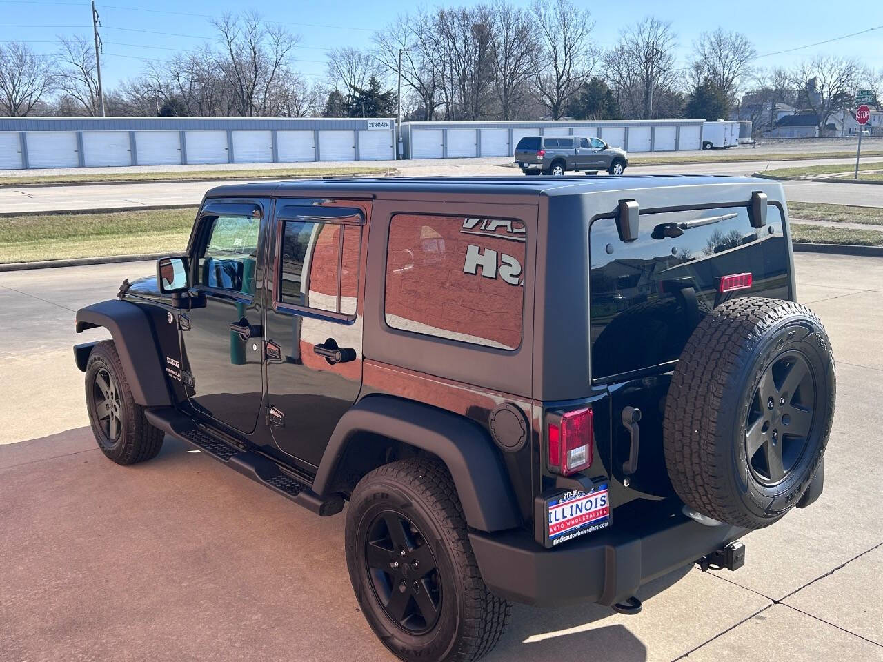 2014 Jeep Wrangler Unlimited for sale at Illinois Auto Wholesalers in Tolono, IL