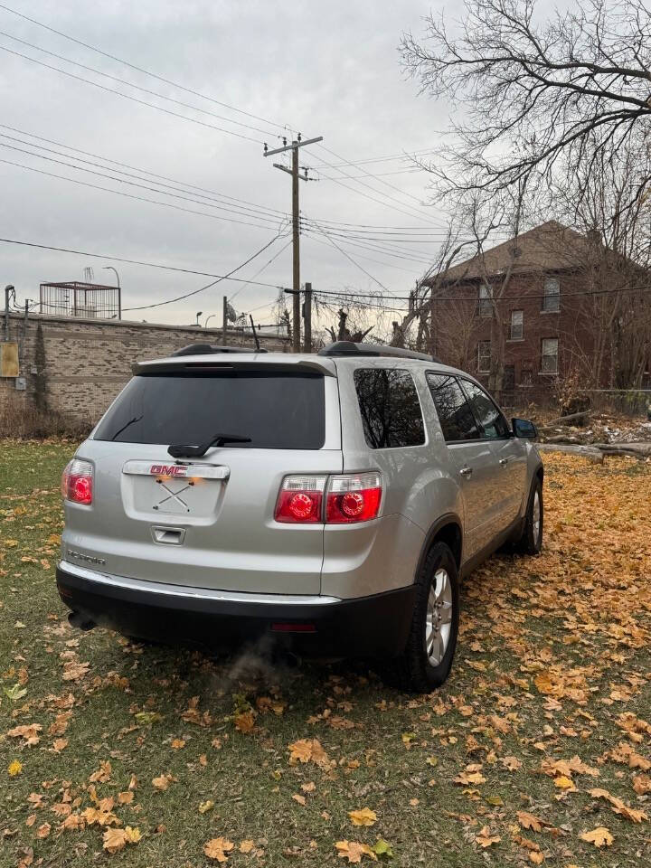 2011 GMC Acadia for sale at H & H AUTO GROUP in Detroit, MI