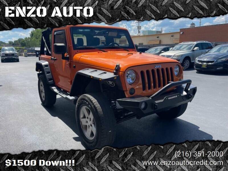2013 Jeep Wrangler for sale at ENZO AUTO in Parma OH