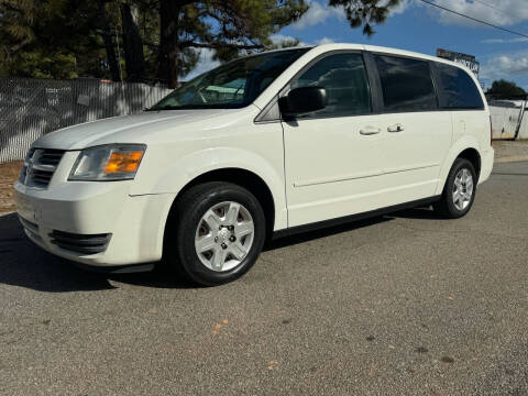 2009 Dodge Grand Caravan for sale at Mandingo's Automotive & Sales LLC in Snellville GA