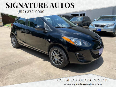 2011 Mazda MAZDA2 for sale at Signature Autos in Austin TX