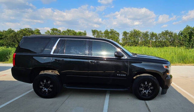 2018 Chevrolet Tahoe for sale at CAR MARKET AUTO GROUP in Sugar Land, TX