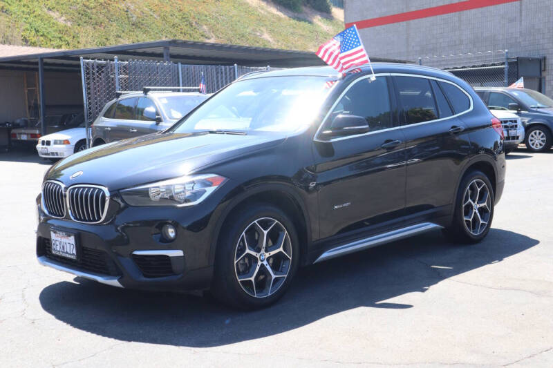 Used 2018 BMW X1 28i with VIN WBXHT3C38J5L24144 for sale in San Diego, CA