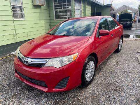 2012 Toyota Camry for sale at Velocity Autos in Winter Park FL