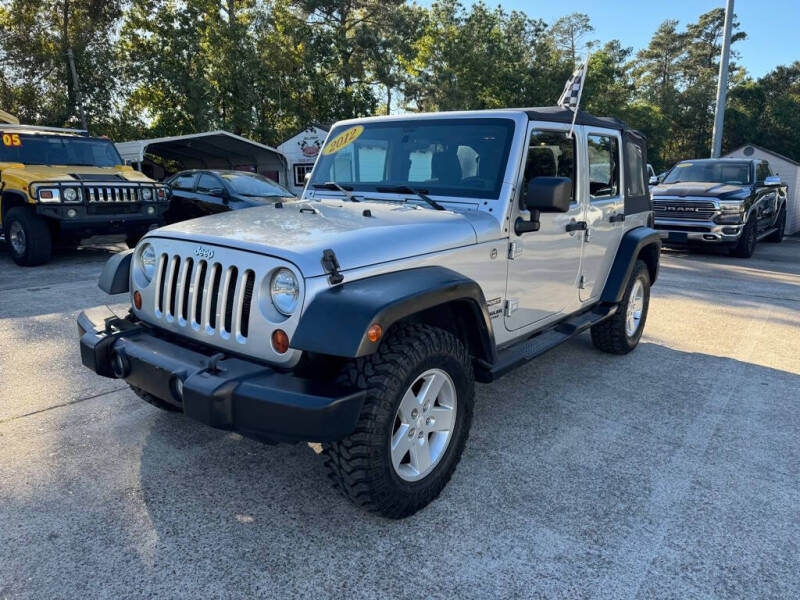 2012 Jeep Wrangler Unlimited for sale at AUTO WOODLANDS in Magnolia TX