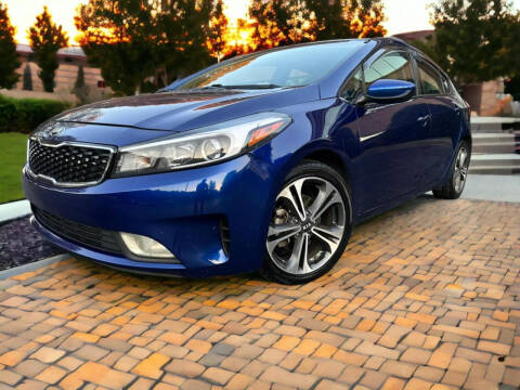 2018 Kia Forte for sale at Carma Auto Group in Duluth GA