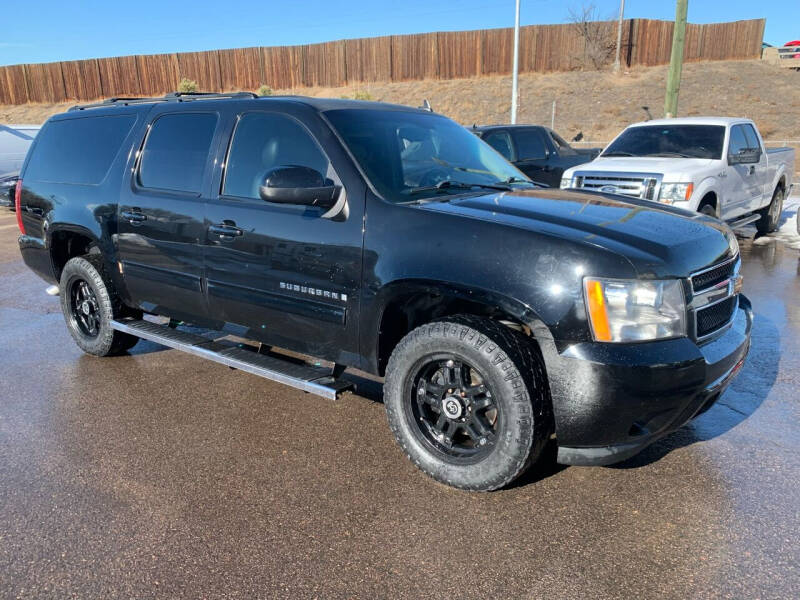 2014 Chevrolet Suburban for sale at McManus Motors in Wheat Ridge CO