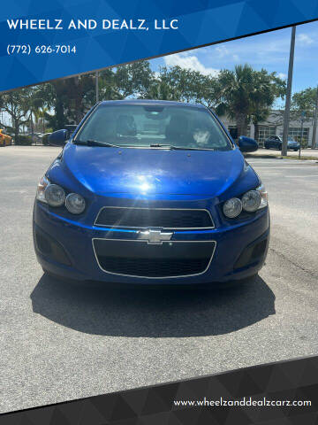 2013 Chevrolet Sonic for sale at WHEELZ AND DEALZ, LLC in Fort Pierce FL