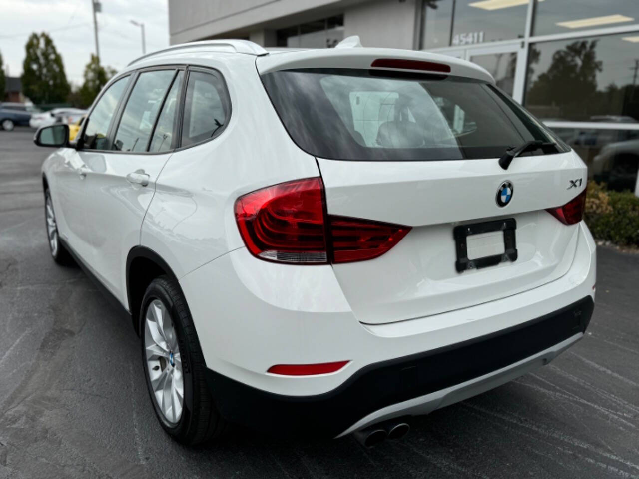 2013 BMW X1 for sale at Opus Motorcars in Utica, MI