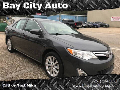 2012 Toyota Camry for sale at Bay City Auto's in Mobile AL