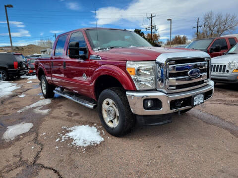 2014 Ford F-250 Super Duty for sale at BERKENKOTTER MOTORS in Brighton CO