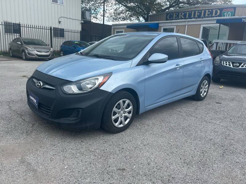 2014 Hyundai Accent for sale at CERTIFIED AUTO GROUP in Houston TX