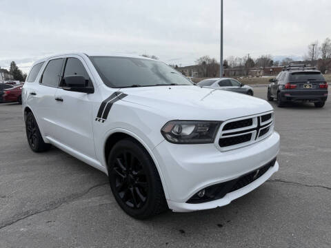 2014 Dodge Durango for sale at BELOW BOOK AUTO SALES in Idaho Falls ID