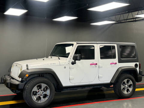 2011 Jeep Wrangler Unlimited for sale at AutoNet of Dallas in Dallas TX