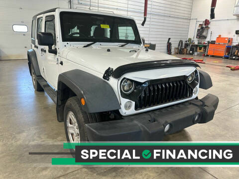 2014 Jeep Wrangler Unlimited for sale at Postal Pete in Galena IL