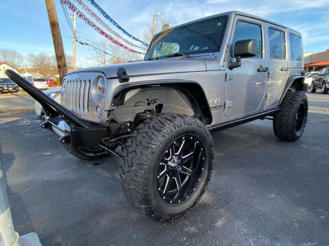 2016 Jeep Wrangler Unlimited for sale at Auto Exchange in The Plains OH