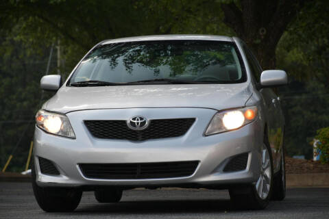 2010 Toyota Corolla for sale at Carma Auto Group in Duluth GA