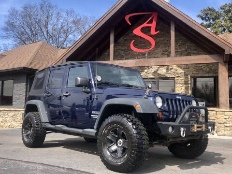 2013 Jeep Wrangler Unlimited for sale at Auto Solutions in Maryville TN
