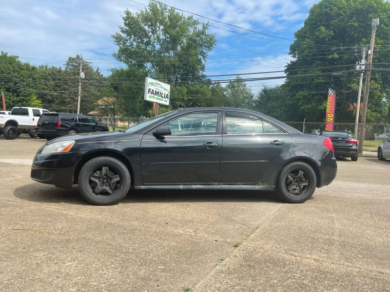 2010 Pontiac G6 for sale at Familia Auto Group LLC in Massillon OH