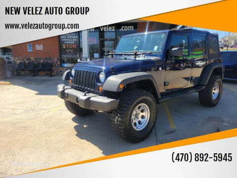 2013 Jeep Wrangler Unlimited for sale at NEW VELEZ AUTO GROUP in Gainesville GA