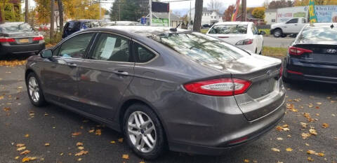 2014 Ford Fusion for sale at CENTRAL 1985 CAR SALE LLC in Colonie, NY