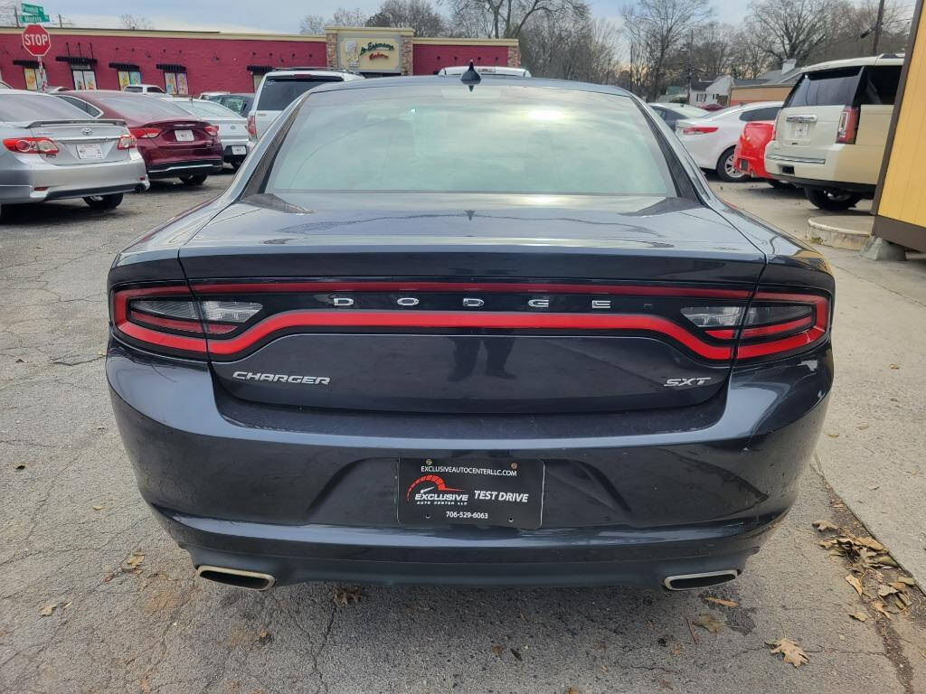 2017 Dodge Charger for sale at DAGO'S AUTO SALES LLC in Dalton, GA