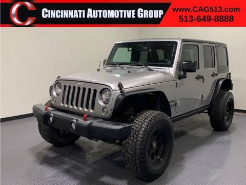 2014 Jeep Wrangler Unlimited for sale at Cincinnati Automotive Group in Lebanon OH