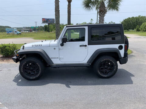 2015 Jeep Wrangler for sale at First Choice Auto Inc in Little River SC