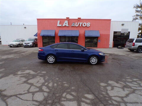2013 Ford Fusion for sale at L A AUTOS in Omaha NE