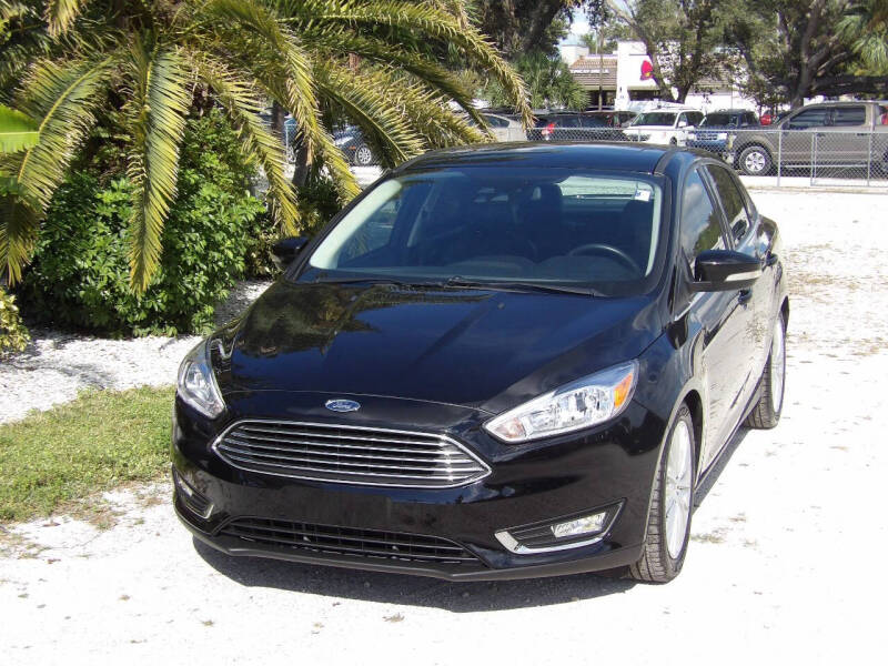 Used 2016 Ford Focus Titanium with VIN 1FADP3J27GL273496 for sale in Fort Myers, FL