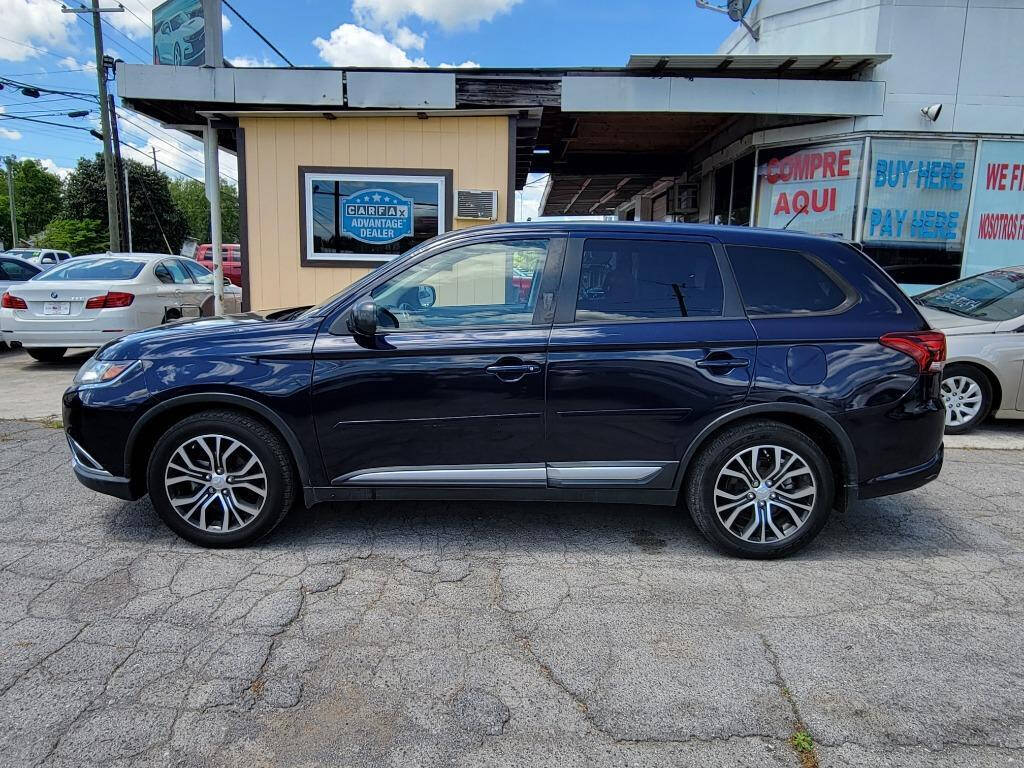 2016 Mitsubishi Outlander for sale at DAGO'S AUTO SALES LLC in Dalton, GA