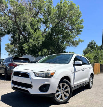 2014 Mitsubishi Outlander Sport for sale at Unlimited Motors, LLC in Denver CO