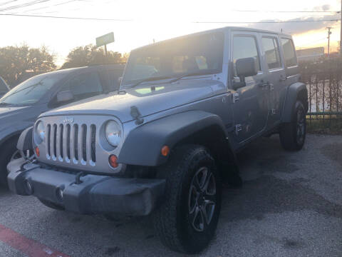 2013 Jeep Wrangler Unlimited for sale at Auto Access in Irving TX