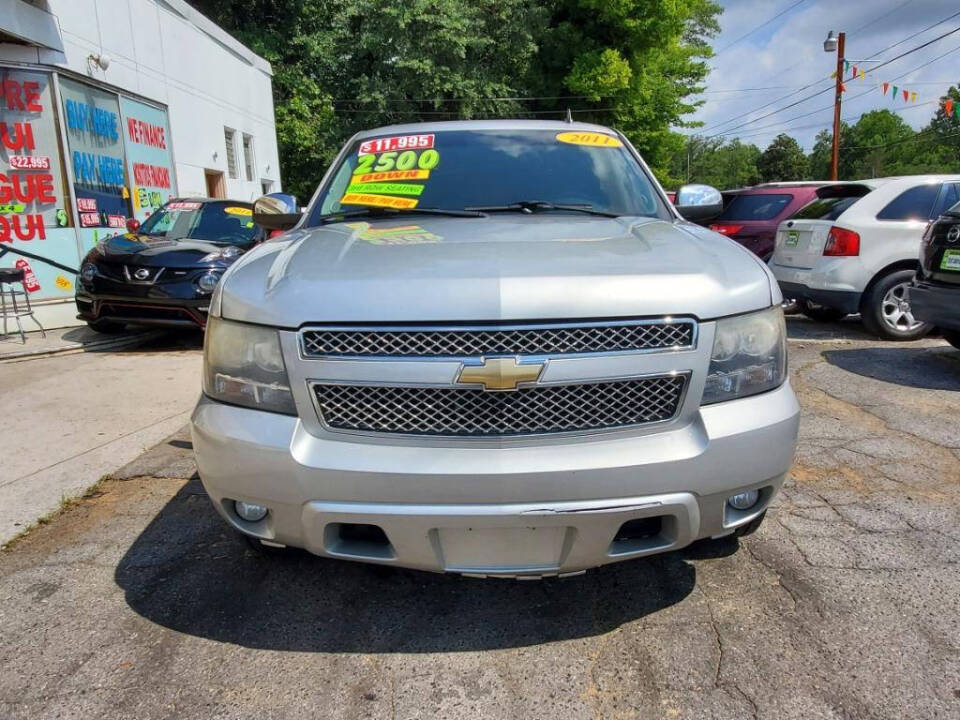 2011 Chevrolet Tahoe for sale at DAGO'S AUTO SALES LLC in Dalton, GA