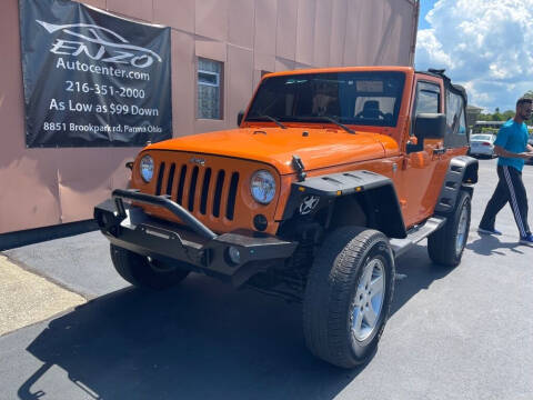 2013 Jeep Wrangler for sale at ENZO AUTO in Parma OH