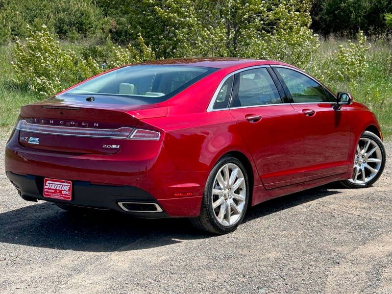 Used 2014 Lincoln MKZ Base with VIN 3LN6L2J95ER801665 for sale in Iron River, MI